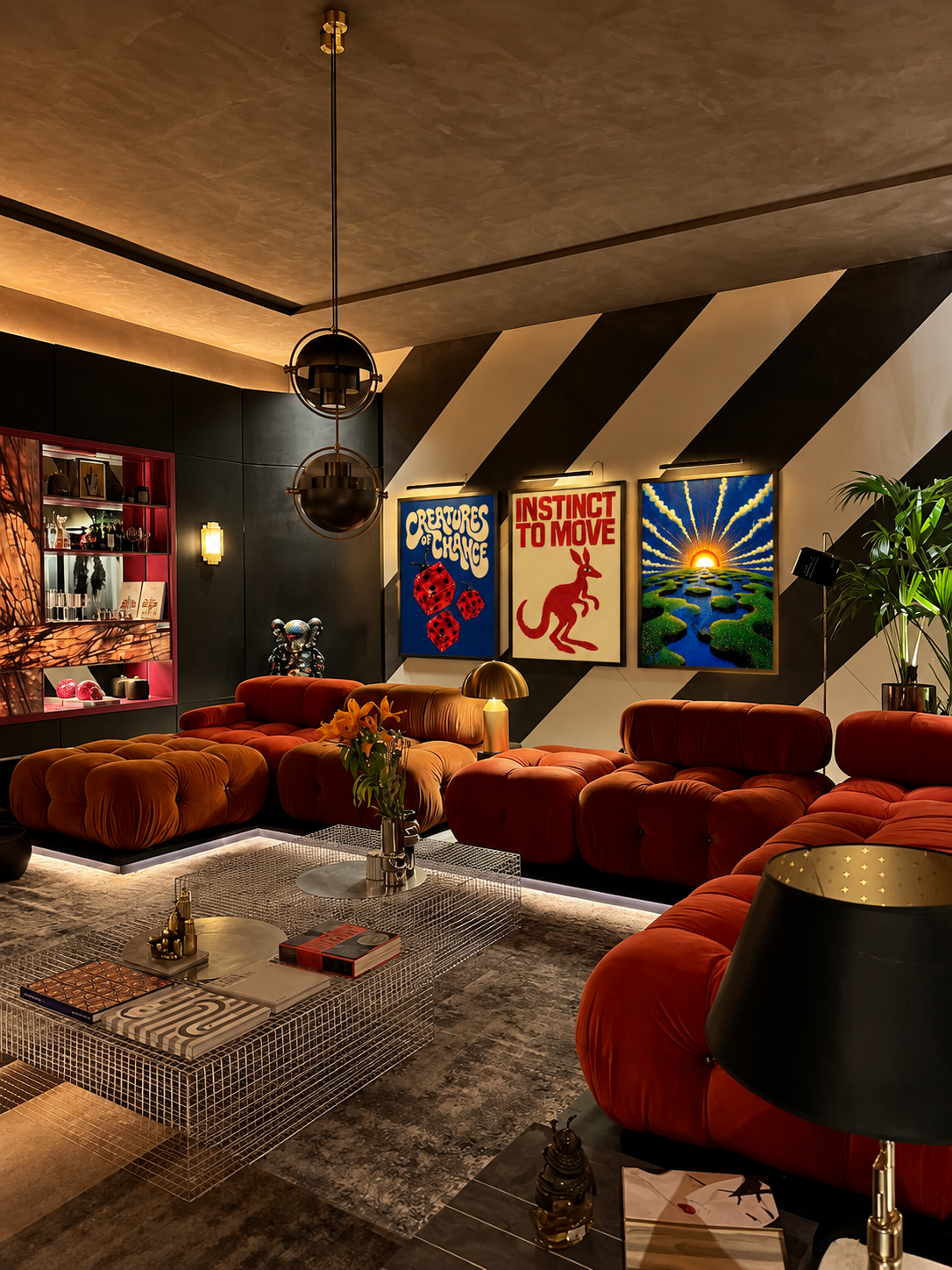 Creatures of Chance, Instinct to Move and Origin Point prints in a moody lounge